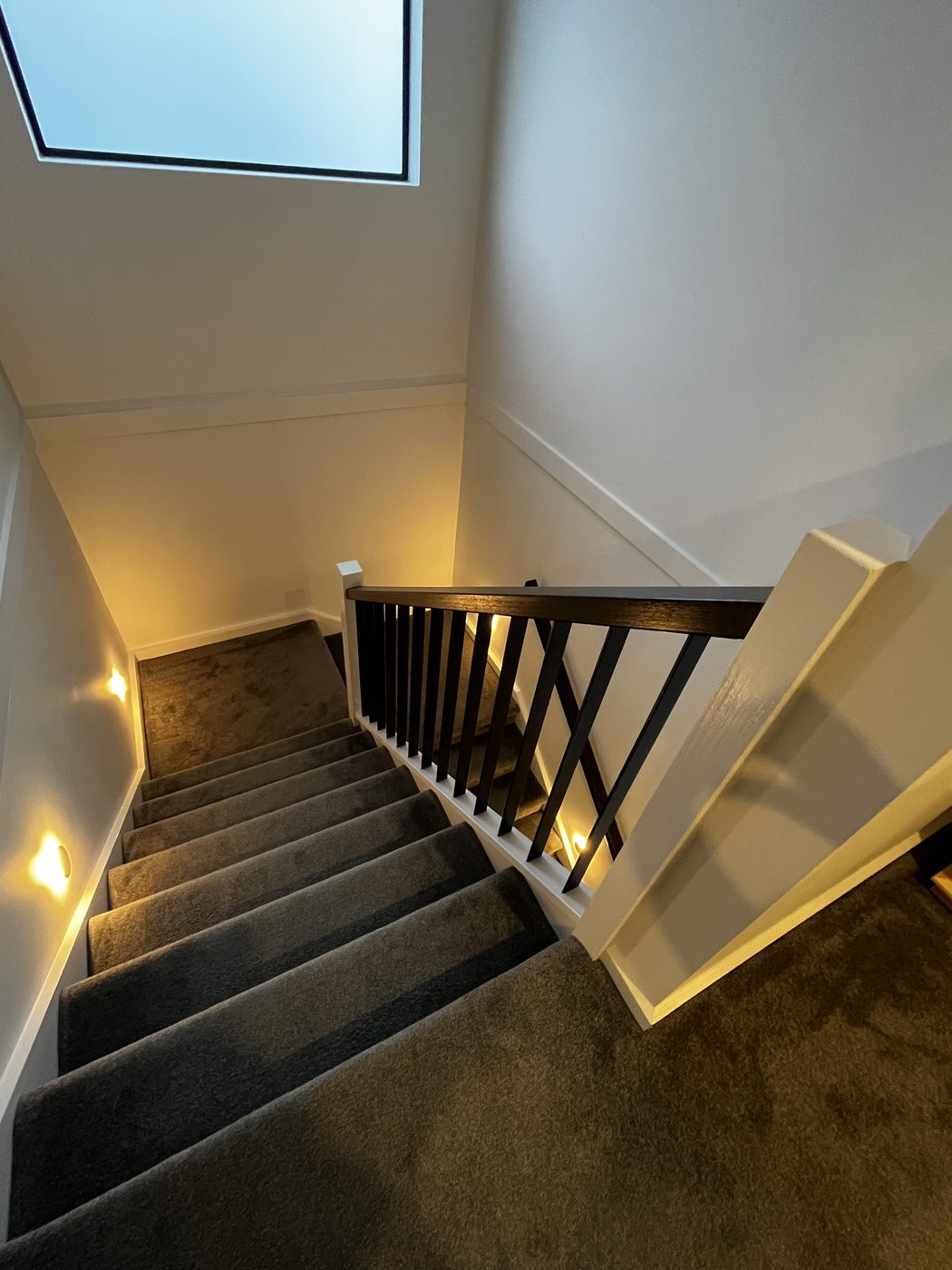 Stairwell with recessed step lighting installed by SALTD Electrical